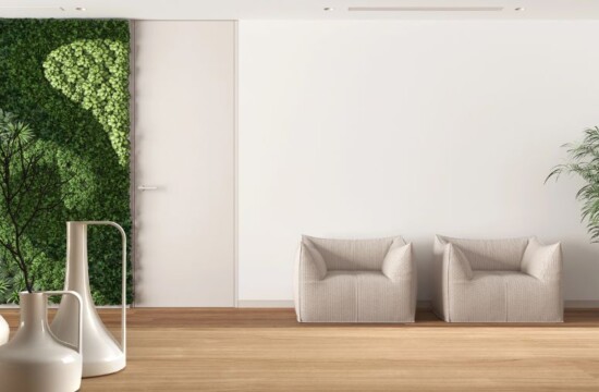 Conheça os usos da grama sintética na arquitetura minimalista com a Stampa Gramas! Parede verde vertical compõe a grama sintética na arquitetura minimalista de sala clean.